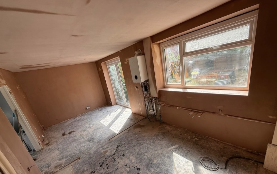 Fresh plasterboard and bare plaster