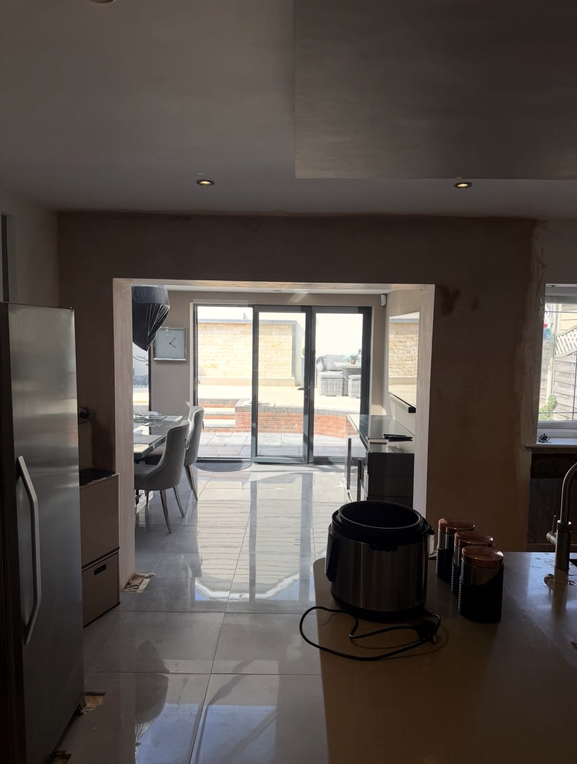 After: the opening freshly plastered through to the patio doors
