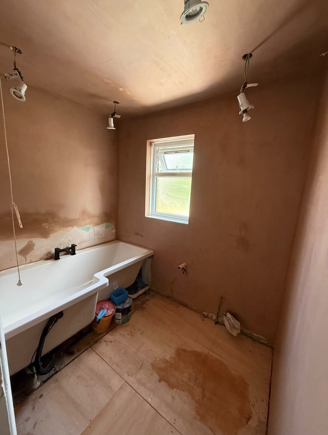 Freshly plastered bathroom walls and ceiling